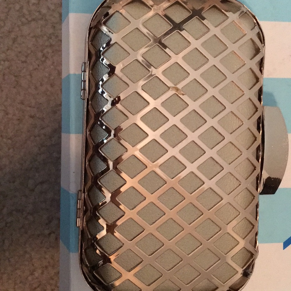 Elegant gold tone clutch purse